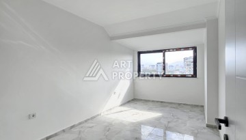 Квартиры 1+1 и дуплексы 2+1 в новом доме в центре Махмутлара. - Ракурс 12