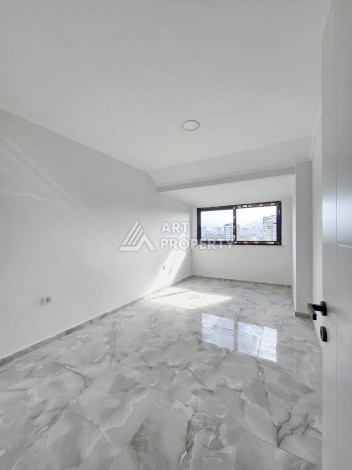 Квартиры 1+1 и дуплексы 2+1 в новом доме в центре Махмутлара. - Ракурс 11