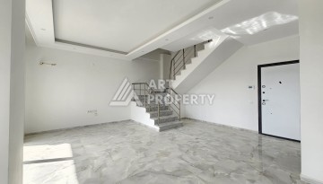 Квартиры 1+1 и дуплексы 2+1 в новом доме в центре Махмутлара. - Ракурс 13