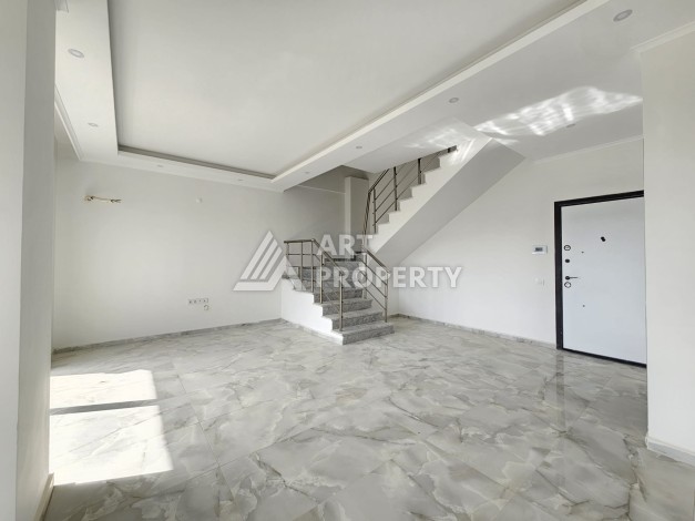 Квартиры 1+1 и дуплексы 2+1 в новом доме в центре Махмутлара. - Ракурс 12