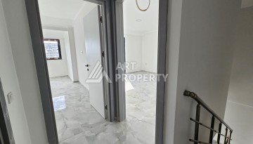 Квартиры 1+1 и дуплексы 2+1 в новом доме в центре Махмутлара. - Ракурс 14