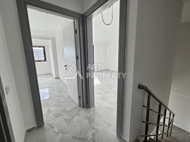 Квартиры 1+1 и дуплексы 2+1 в новом доме в центре Махмутлара. - Ракурс 13