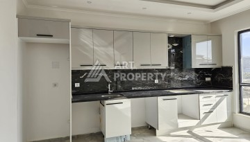 Квартиры 1+1 и дуплексы 2+1 в новом доме в центре Махмутлара. - Ракурс 15