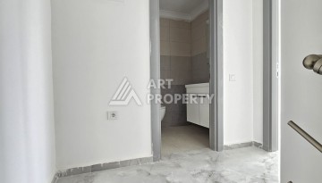 Квартиры 1+1 и дуплексы 2+1 в новом доме в центре Махмутлара. - Ракурс 17