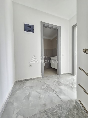 Квартиры 1+1 и дуплексы 2+1 в новом доме в центре Махмутлара. - Ракурс 16