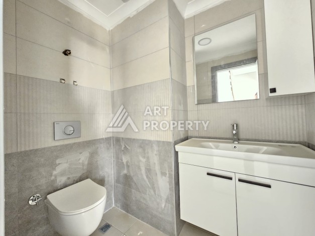 Квартиры 1+1 и дуплексы 2+1 в новом доме в центре Махмутлара. - Ракурс 17