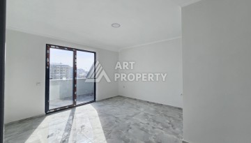 Квартиры 1+1 и дуплексы 2+1 в новом доме в центре Махмутлара. - Ракурс 19