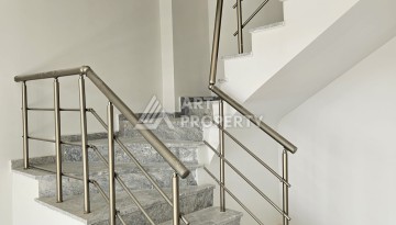 Квартиры 1+1 и дуплексы 2+1 в новом доме в центре Махмутлара. - Ракурс 23