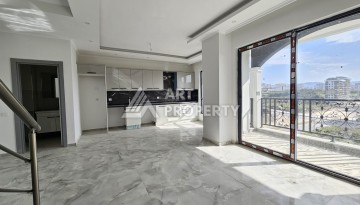 Квартиры 1+1 и дуплексы 2+1 в новом доме в центре Махмутлара. - Ракурс 24