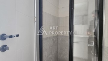 Квартиры 1+1 и дуплексы 2+1 в новом доме в центре Махмутлара. - Ракурс 26