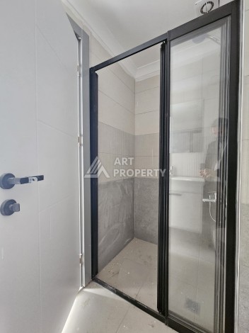 Квартиры 1+1 и дуплексы 2+1 в новом доме в центре Махмутлара. - Ракурс 25