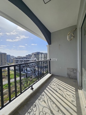 Квартиры 1+1 и дуплексы 2+1 в новом доме в центре Махмутлара. - Ракурс 26