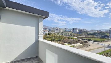 Квартиры 1+1 и дуплексы 2+1 в новом доме в центре Махмутлара. - Ракурс 31