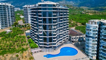 Квартира 2+1 со стильным интерьером в Махмутларе, 90 кв.м. - Ракурс 1