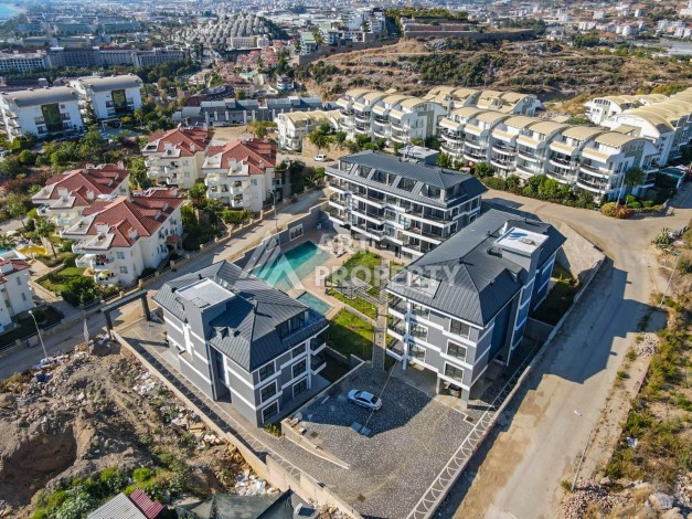 Квартиры 1+1 в современной резиденции, 48 кв.м. Конаклы, Алания - Ракурс 21