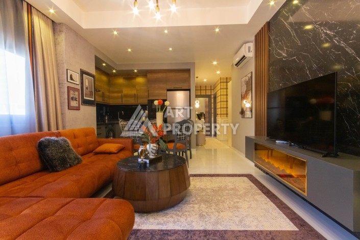 Стильная квартира 2+1 с дизайнерским ремонтом в элитном комплексе района Махмутлар - Ракурс 1