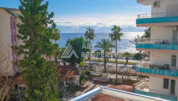 Недорогая квартира с видом на море 2+1 на первой береговой линии в Махмутларе, 90 кв.м. - Ракурс 1