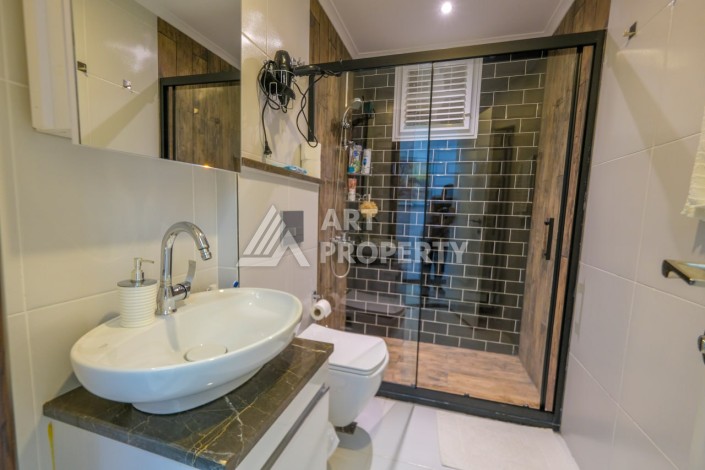 Стильная квартира 2+1 с видом на море в дизайнерском комплексе 2021 года - Ракурс 37