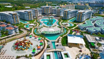 Квартира 1+1 в крупной резиденции с отелем 5 звезд, 85 кв.м. Турклер, Алания - Ракурс 1