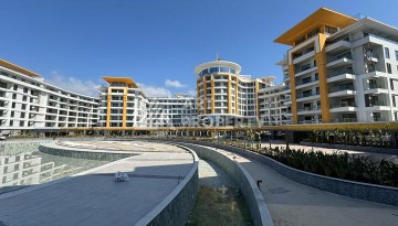 Квартира 1+1 в крупной резиденции с отелем 5 звезд, 85 кв.м. Турклер, Алания - Ракурс 4