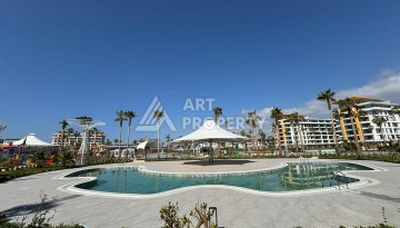 Квартира 1+1 в крупной резиденции с отелем 5 звезд, 85 кв.м. Турклер, Алания - Ракурс 5