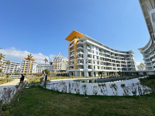 Квартира 1+1 в крупной резиденции с отелем 5 звезд, 85 кв.м. Турклер, Алания - Ракурс 7