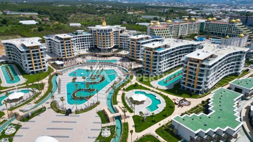 Квартира 1+1 в крупной резиденции с отелем 5 звезд, 85 кв.м. Турклер, Алания - Ракурс 8