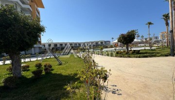 Квартира 1+1 в крупной резиденции с отелем 5 звезд, 85 кв.м. Турклер, Алания - Ракурс 16