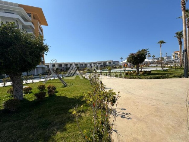 Квартира 1+1 в крупной резиденции с отелем 5 звезд, 85 кв.м. Турклер, Алания - Ракурс 15