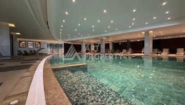 Квартира 1+1 в крупной резиденции с отелем 5 звезд, 85 кв.м. Турклер, Алания - Ракурс 21