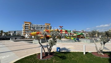 Квартира 1+1 в крупной резиденции с отелем 5 звезд, 85 кв.м. Турклер, Алания - Ракурс 25