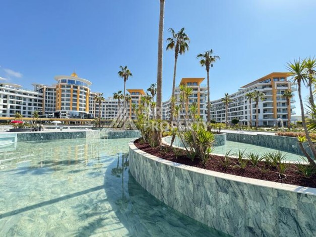 Квартира 1+1 в крупной резиденции с отелем 5 звезд, 85 кв.м. Турклер, Алания - Ракурс 27