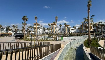 Квартира 1+1 в крупной резиденции с отелем 5 звезд, 85 кв.м. Турклер, Алания - Ракурс 30