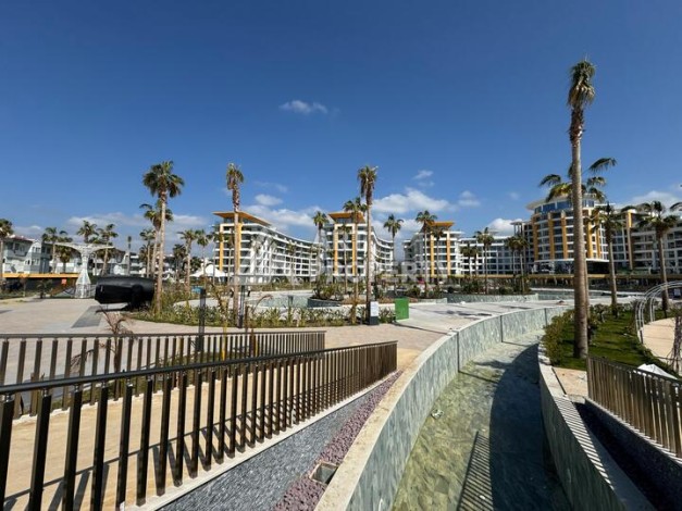 Квартира 1+1 в крупной резиденции с отелем 5 звезд, 85 кв.м. Турклер, Алания - Ракурс 29