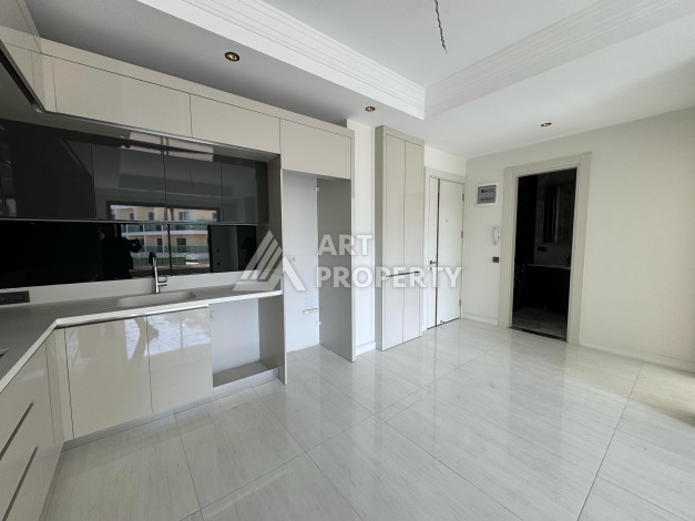 Квартира 1+1 в крупной резиденции с отелем 5 звезд, 85 кв.м. Турклер, Алания - Ракурс 50