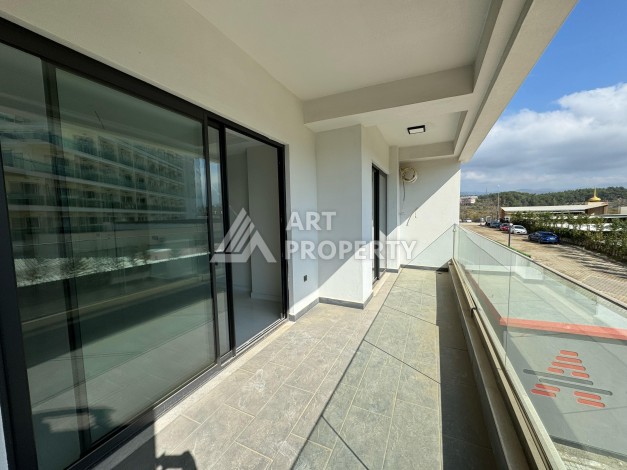 Квартира 1+1 в крупной резиденции с отелем 5 звезд, 85 кв.м. Турклер, Алания - Ракурс 54