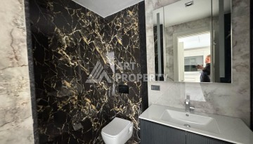 Квартира 1+1 в крупной резиденции с отелем 5 звезд, 85 кв.м. Турклер, Алания - Ракурс 56