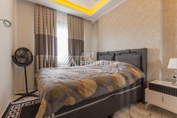 Квартира с мебелью  по хорошей цене в районе Махмутлар - Ракурс 1