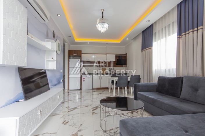 Квартира с мебелью  по хорошей цене в районе Махмутлар - Ракурс 11