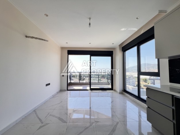 Недорогая квартира 1+1 в новом комплексе в районе Демирташ, 1200 м до моря - Ракурс 5