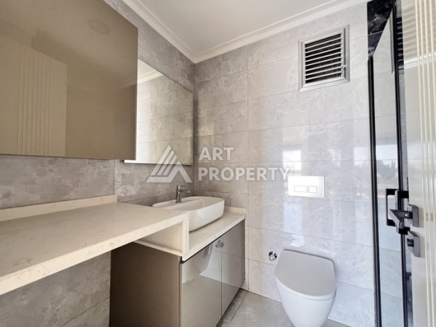 Недорогая квартира 1+1 в новом комплексе в районе Демирташ, 1200 м до моря - Ракурс 11