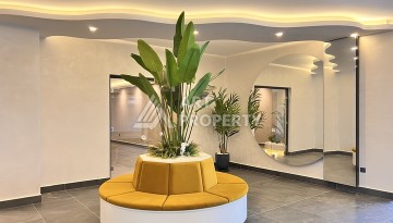 Недорогая квартира 1+1 в новом комплексе в районе Демирташ, 1200 м до моря - Ракурс 17