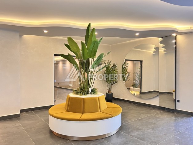 Недорогая квартира 1+1 в новом комплексе в районе Демирташ, 1200 м до моря - Ракурс 16