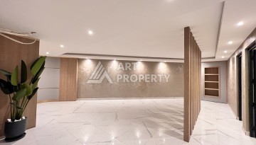 Недорогая квартира 1+1 в новом комплексе в районе Демирташ, 1200 м до моря - Ракурс 18