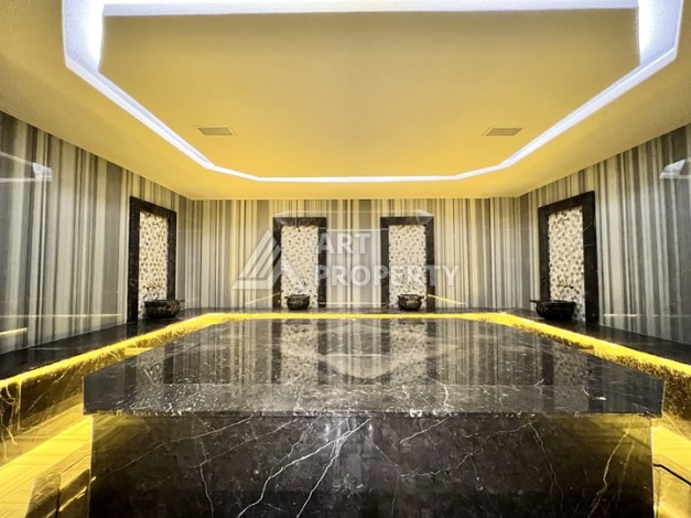 Недорогая квартира 1+1 в новом комплексе в районе Демирташ, 1200 м до моря - Ракурс 25