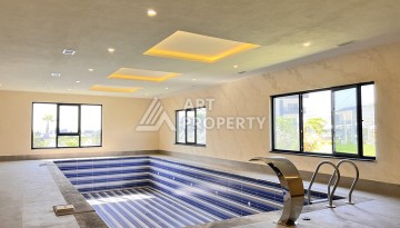 Недорогая квартира 1+1 в новом комплексе в районе Демирташ, 1200 м до моря - Ракурс 27