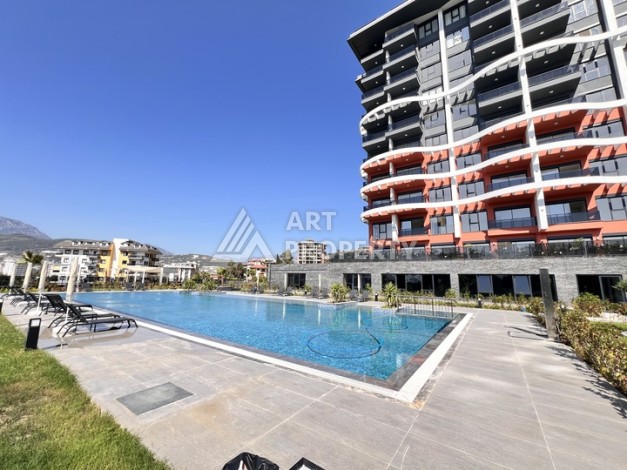 Недорогая квартира 1+1 в новом комплексе в районе Демирташ, 1200 м до моря - Ракурс 31