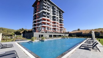 Недорогая квартира 1+1 в новом комплексе в районе Демирташ, 1200 м до моря - Ракурс 33