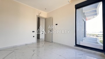 Недорогая квартира 1+1 в новом комплексе в районе Демирташ - Ракурс 9