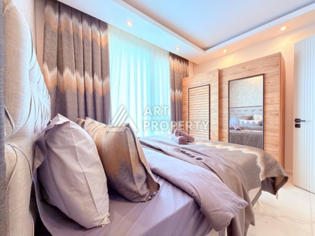 Стильная современная квартира 2+1 в новом комплексе в районе Каргыджак с видами на горы - Ракурс 11